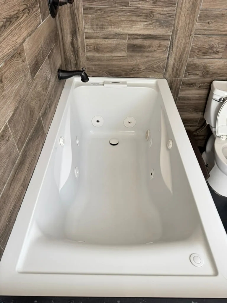 Bathtub after a deep cleaning by 7 General Services — bright, spotless white surface, Greater Boston, MA