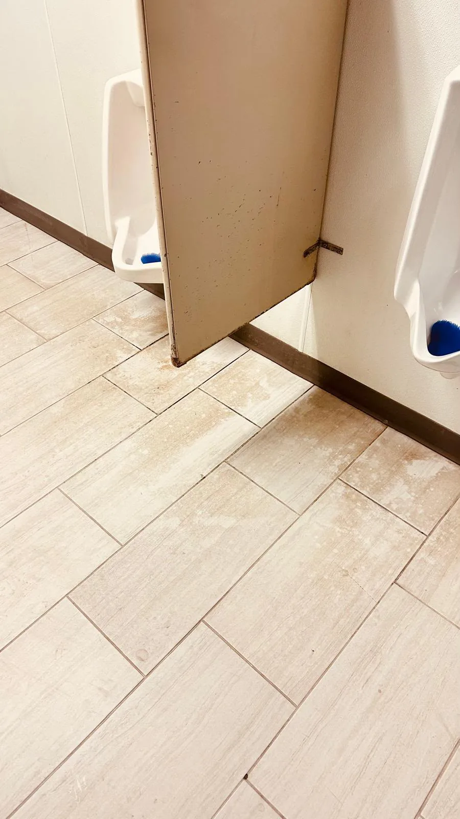 Commercial restroom floor before cleaning — stained, dirty tile, Greater Boston, MA