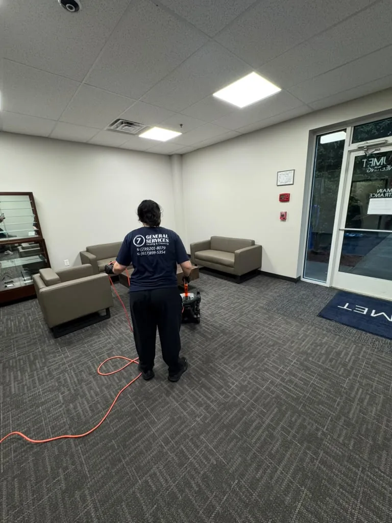 7 General Services technician cleaning a commercial office lobby in Greater Boston, MA