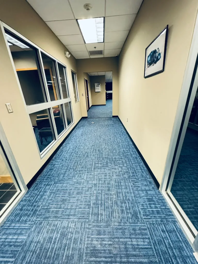 Clean office corridor with fresh carpet in Greater Boston, MA