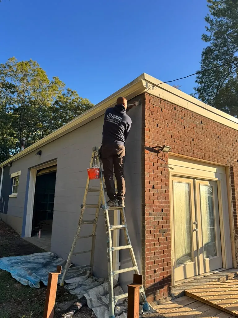Commercial exterior painting of a brick building in Massachusetts