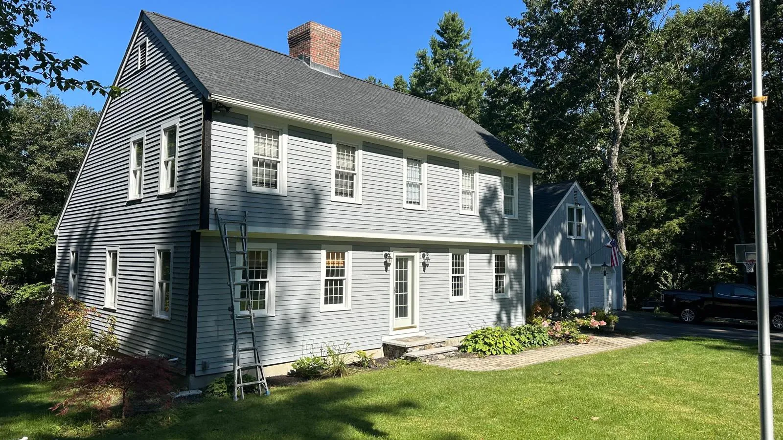 Repainted colonial home exterior in Middlesex County, MA